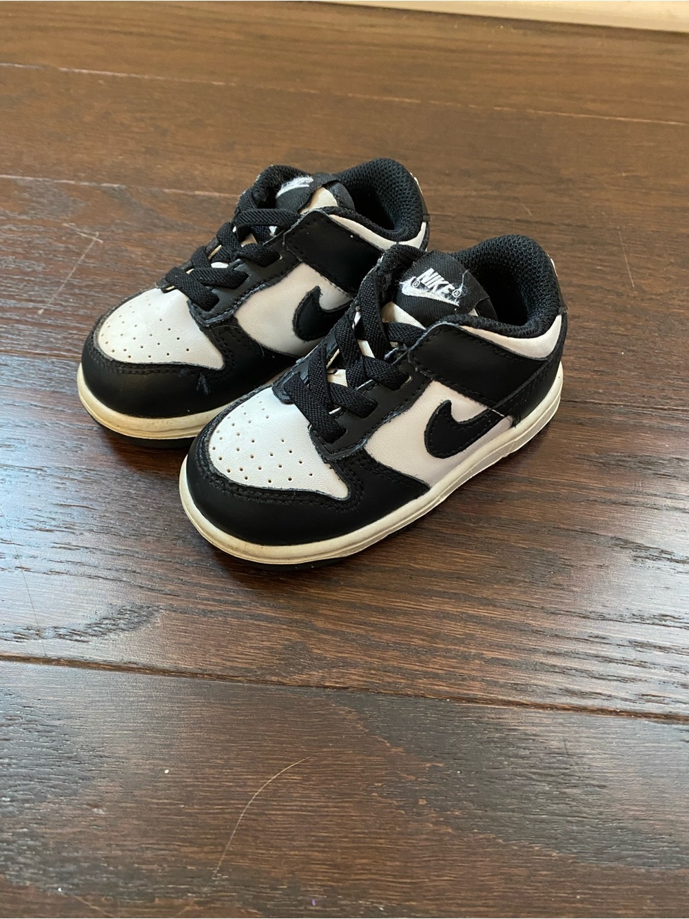 Nike Kids Black and White Low-Top Sneakers with Swoosh